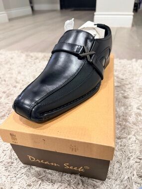 Dream Seek Black Men’s Slip-On Dress Loafers with Metal Accent
